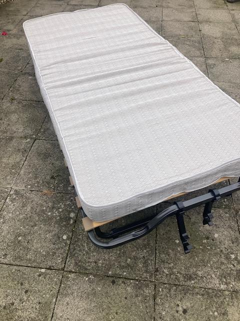Preview of the first image of Folding Bed with mattress.