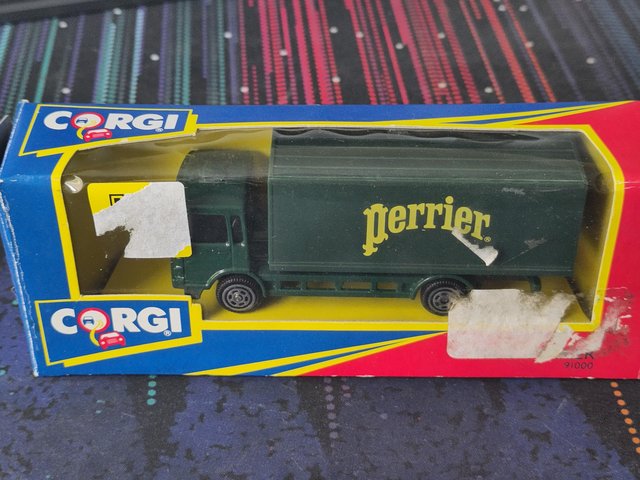 Preview of the first image of Corgi Man -Perrier van 91000- vintage from 1992.