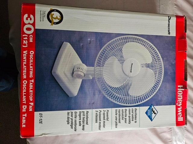 Preview of the first image of Oscillating fan, 30cm, brand new in box.