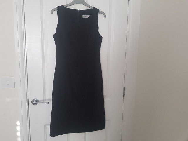 Preview of the first image of Woman's Shift dress in black.