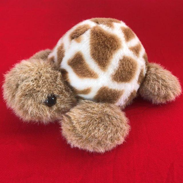 Preview of the first image of Vintage 1990s tortoise plush toy, 9" long – displayed only..