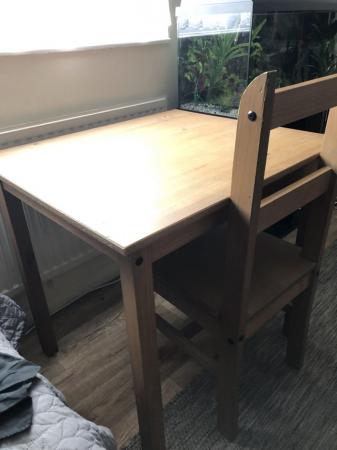 Image 1 of Small wooden table assembled and two chair