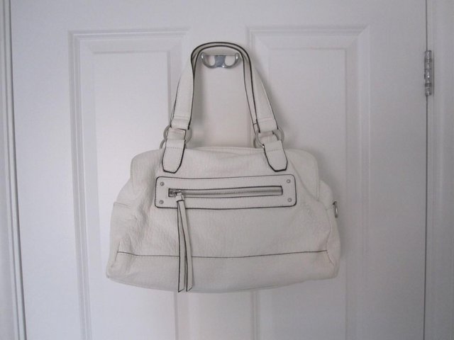 Preview of the first image of 2 handle white/cream handbag.