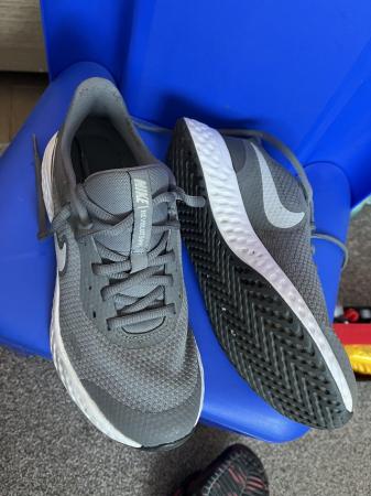 Image 1 of Nike trainers size 4 boy or girl grey& white