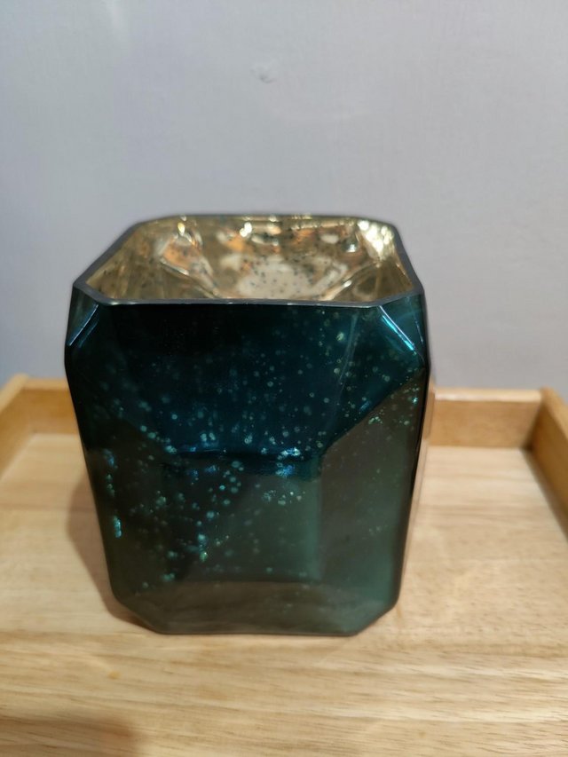 Preview of the first image of Anthropologie Glass Candle Holder.