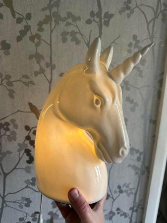 Image 2 of A White ceramic Unicorn Lamp.