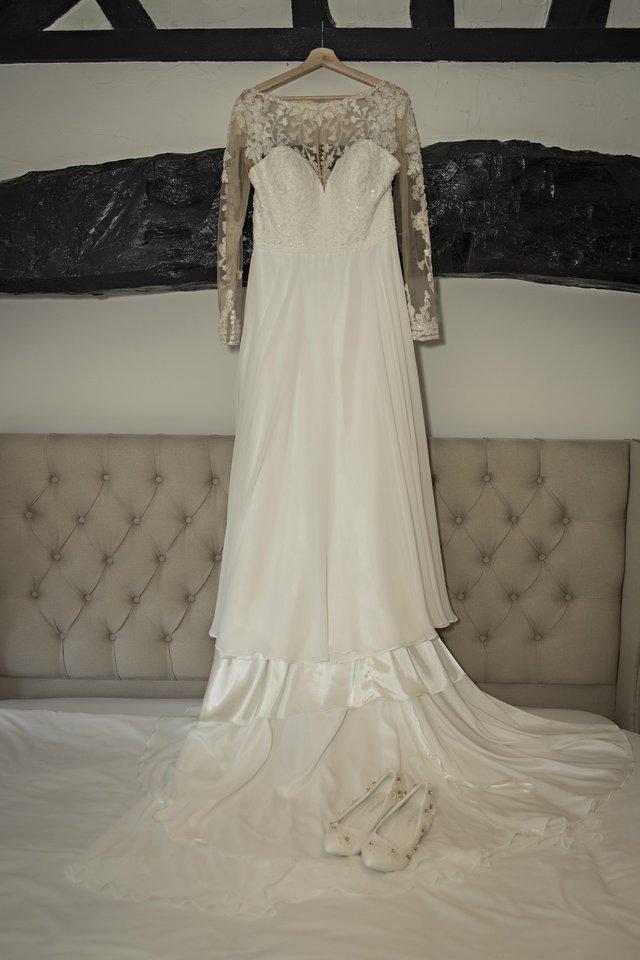 Preview of the first image of Sincerity Bridal Wedding Dress.