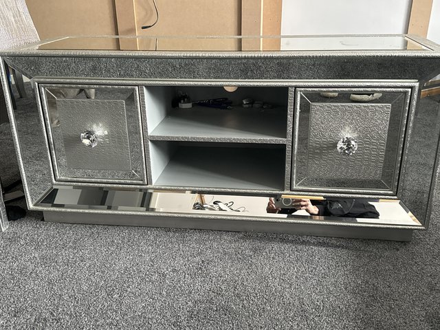 Preview of the first image of Mirrored tv unit with moc croc.