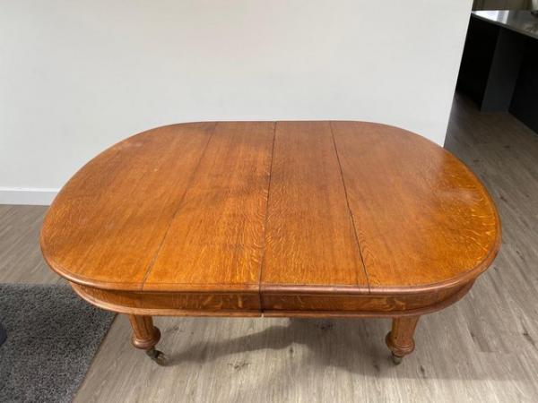 Image 1 of Victorian/ Edwardian Oak, wind out extending dining table
