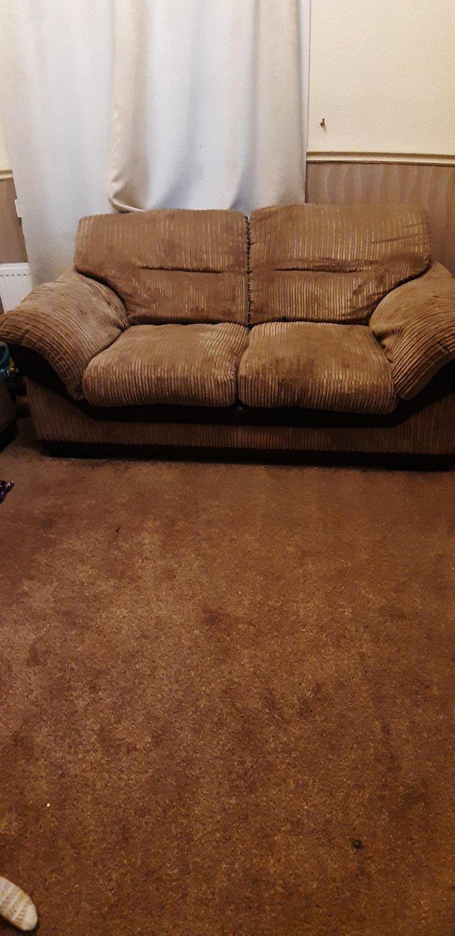 Preview of the first image of Two two seater Dfs sofas good condition.