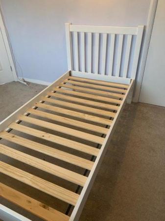 Image 2 of Single white wooden bed frame.