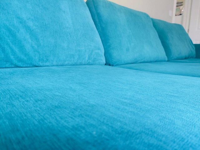 Preview of the first image of DFS Teal Sofa & Whirl Chair - Like New.