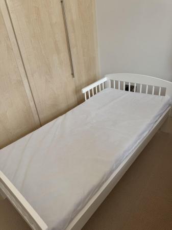 Image 1 of Wooden bed with mattress for toddler from Amazon