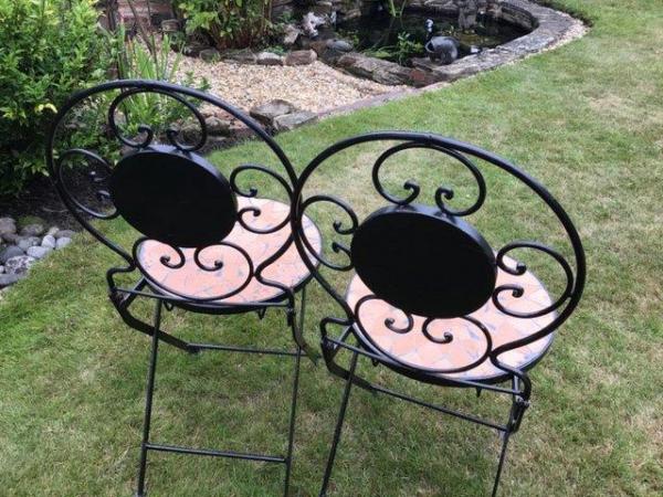 Image 2 of 2 wrought iron garden chair with mosaic back and seat.