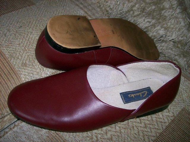 Preview of the first image of Clarks Slippers. Size 10.5. Coated Leather (C129).