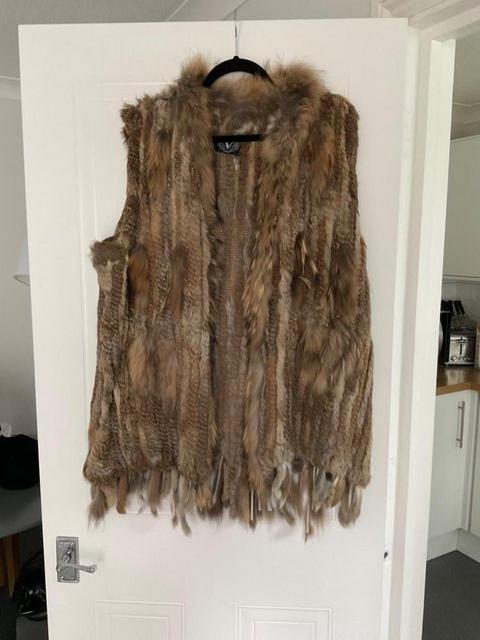 Preview of the first image of Rabbit fur knee length waistcoat.