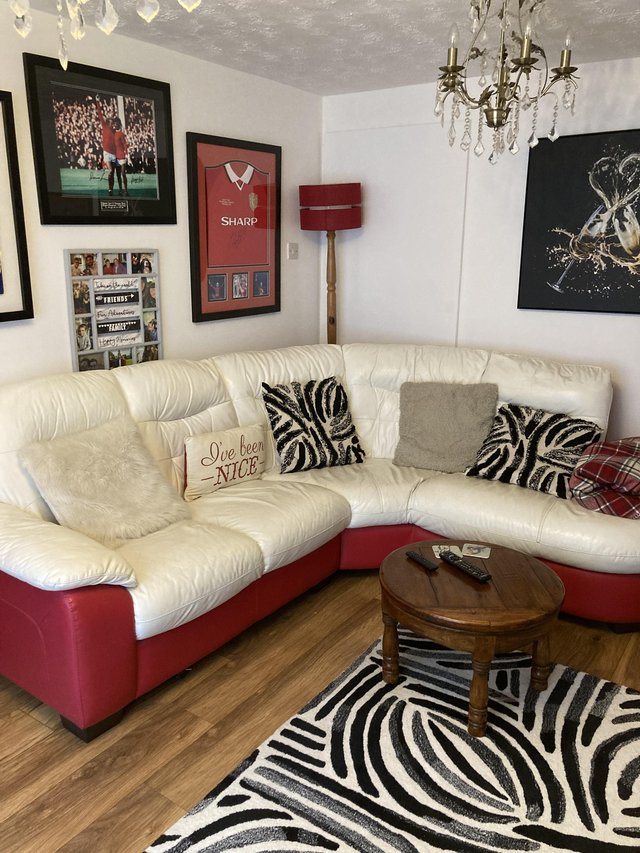 Preview of the first image of Corner Sofa in red and cream leather, very good condition.