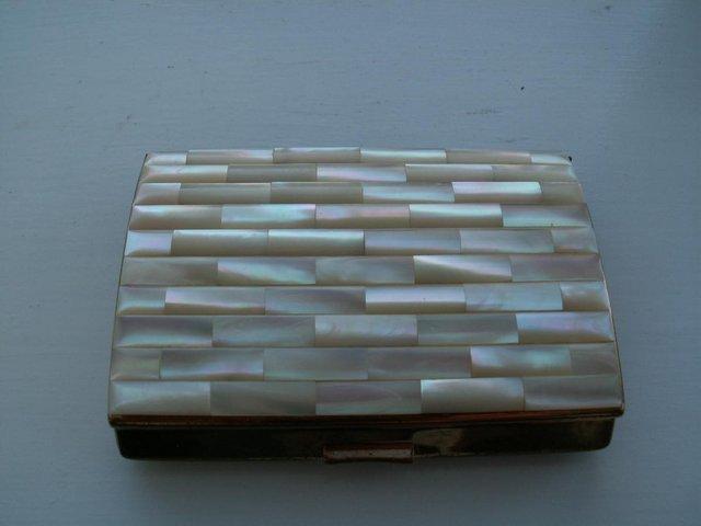 Preview of the first image of cigarette case.  mother of pearl style lid. circa 1960.