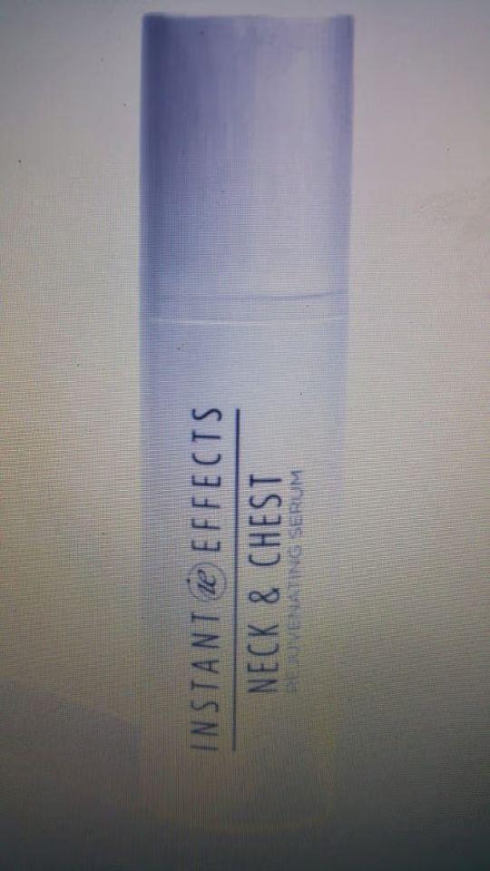 Preview of the first image of Brand new in box instant neck & chest rejuvenating serum.