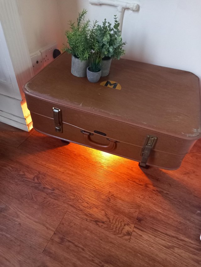 Preview of the first image of Suitcase coffee/side table display unit.