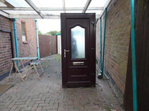 Image 2 of UPVC Rose Wood Front Door for sale
