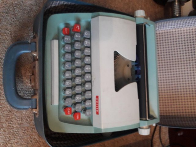 Preview of the first image of VINTAGE PETITE TYPEWRITER.