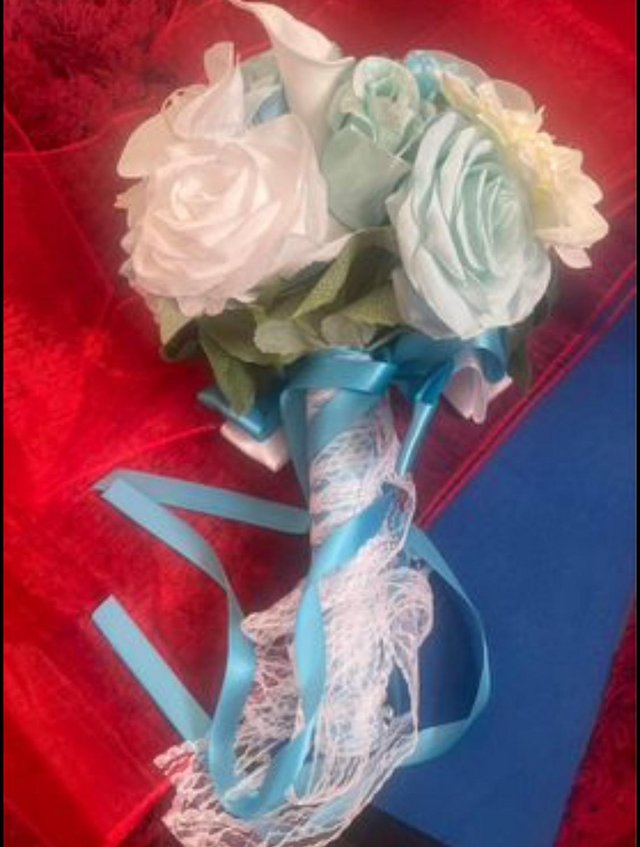 Preview of the first image of Blue & White Wedding/prom Bouquet.