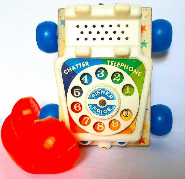 Preview of the first image of EARLY 1960's PULL ALONG TOY TELEPHONE - CHATTERBOX complete.