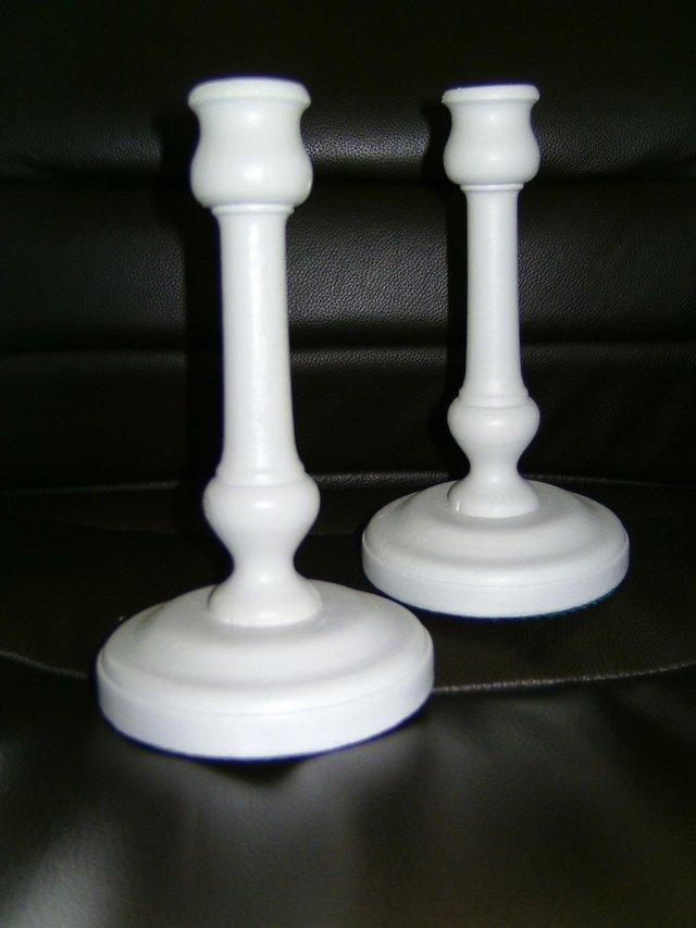 Preview of the first image of pair of vintage wooden candlesticks.