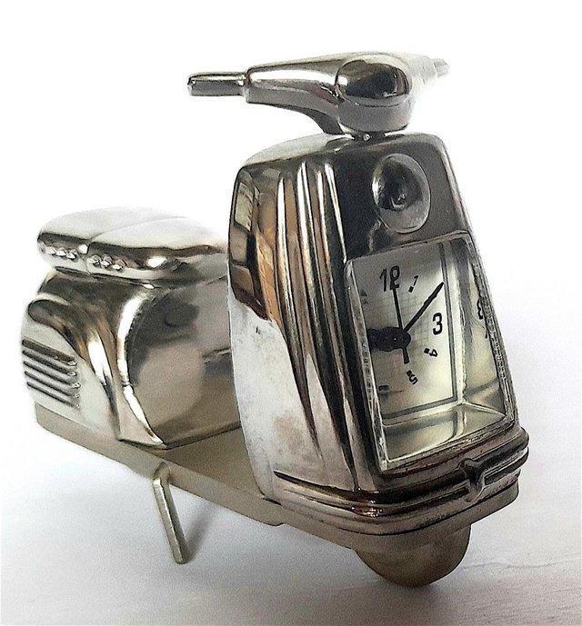 Preview of the first image of MINIATURE NOVELTY CLOCK - 1960's SCOOTER.