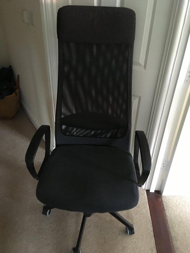 Preview of the first image of Executive chair with ultra high back.