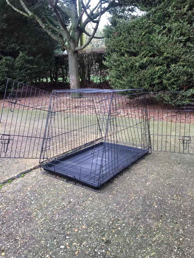 Preview of the first image of A Black Folding Dog Crate.