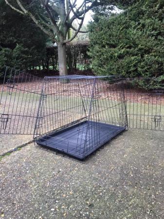 Image 1 of A Black Folding Dog Crate