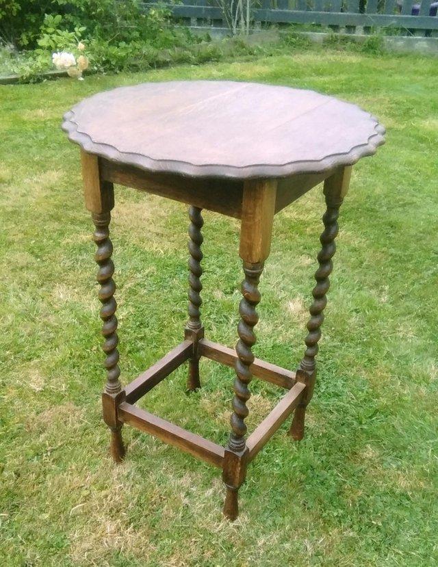 Preview of the first image of ANTIQUE OAK LATE VICTORIAN ROUND OCCASIONAL TABLE.