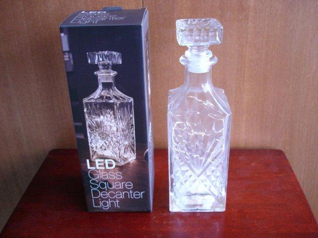 Preview of the first image of LED DECANTER LIGHT STILL IN BOX.