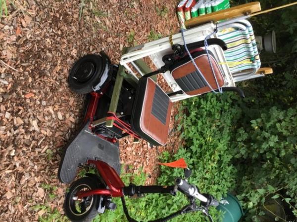 Image 2 of Small red scooter, + charger, £350 offers."