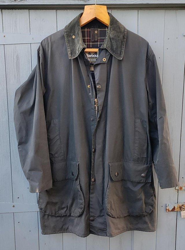Preview of the first image of Vintage blue Barbour Border waxed jacket.