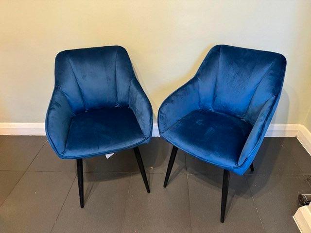 Preview of the first image of Pair of dark blue velvet dining chairs.