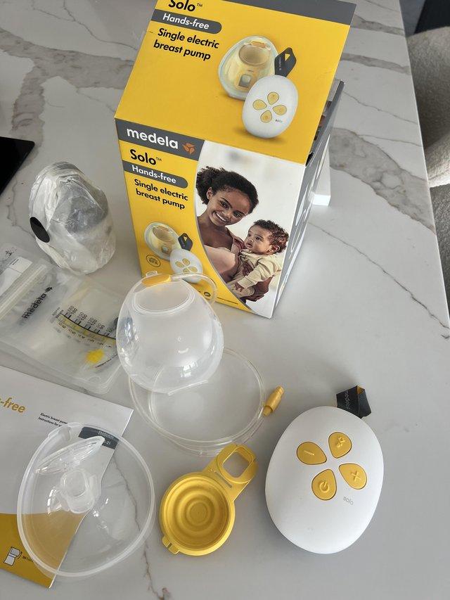 Preview of the first image of Medela Solo Hands-Free Breast Pump.