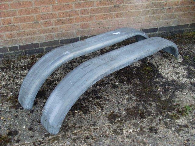 Preview of the first image of Twin axle trailer mudguards 10 inch galvanised.