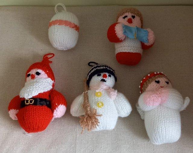 Preview of the first image of Hand Knitted Christmas Tree Decorations x 5.