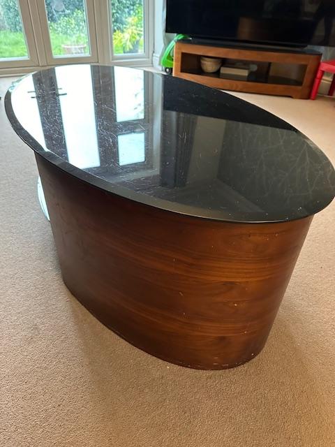 Preview of the first image of Smoked glass and wood coffee table.