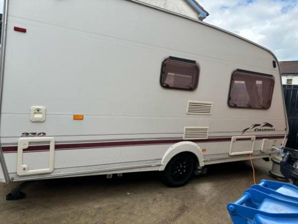 Image 2 of Lovely 2004 swift 2 berth charisma 230 with motor mover