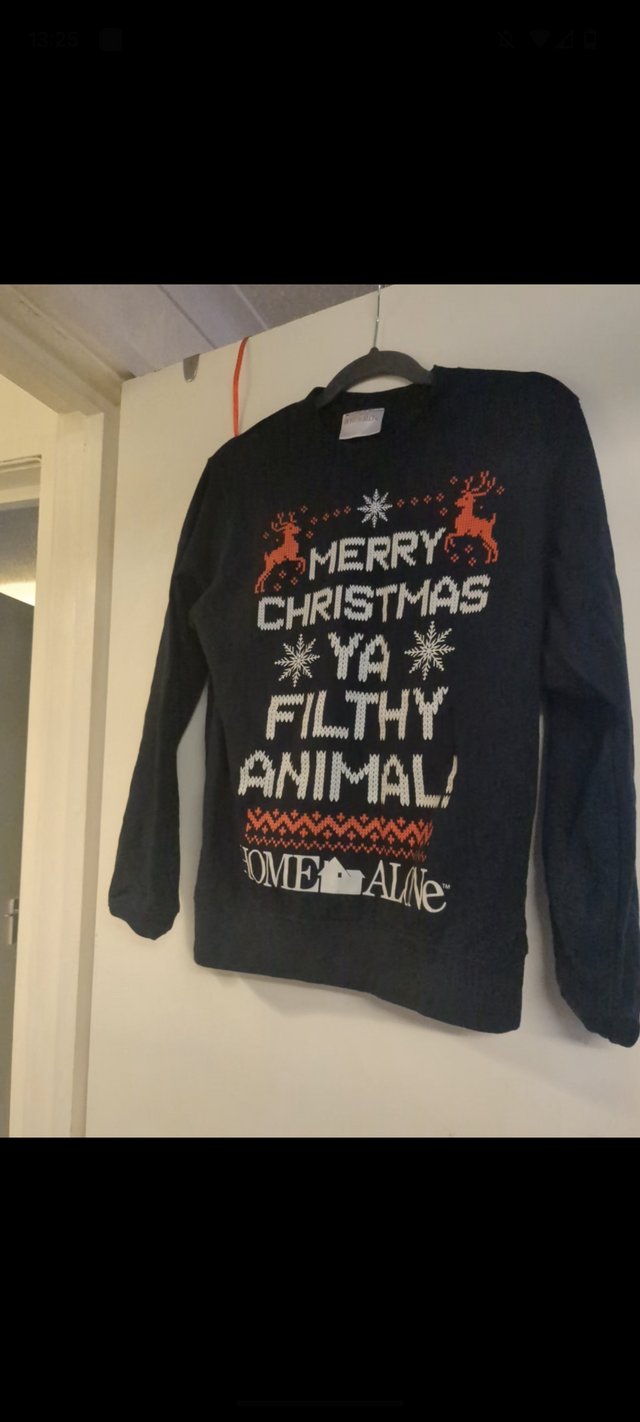 Preview of the first image of Merry Christmas ya filthy animal home alone jumper size 12.