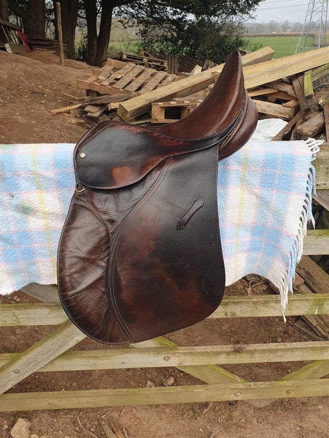 Preview of the first image of Brown leather pony saddle 16" medium fit..