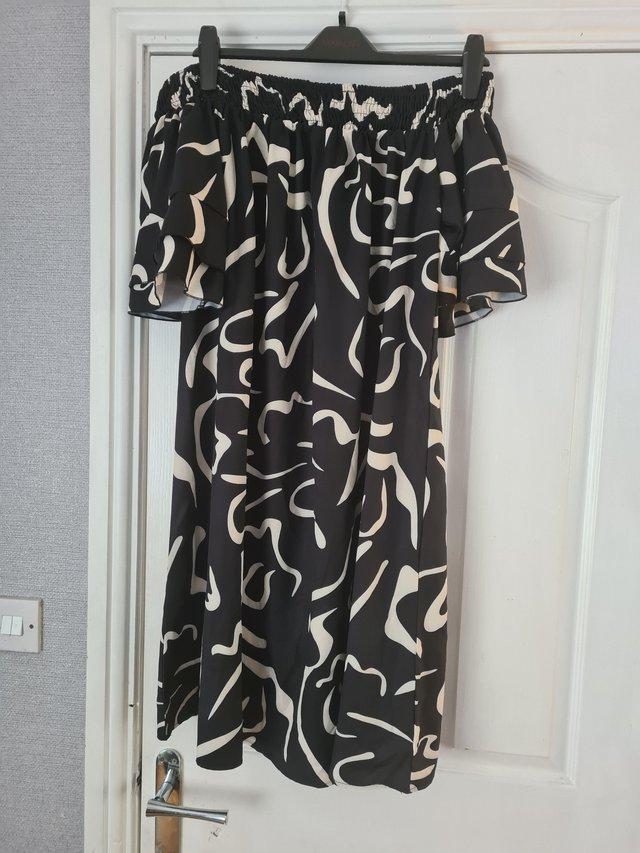 Preview of the first image of Three dresses never been worn. Size 4 x from shein..