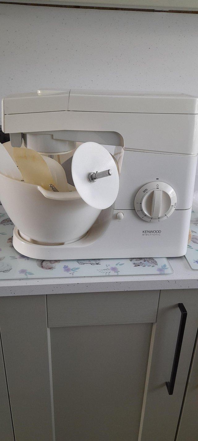 Preview of the first image of Kenwood food mixer with all attachments.