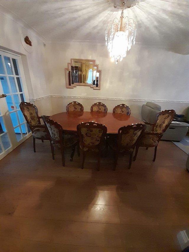 Preview of the first image of Italian Dining Table + 8 Chairs.