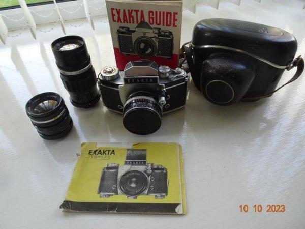 Image 1 of EXAKTA35mm camera with extra lens.
