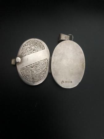Image 2 of Silver locket for sale.